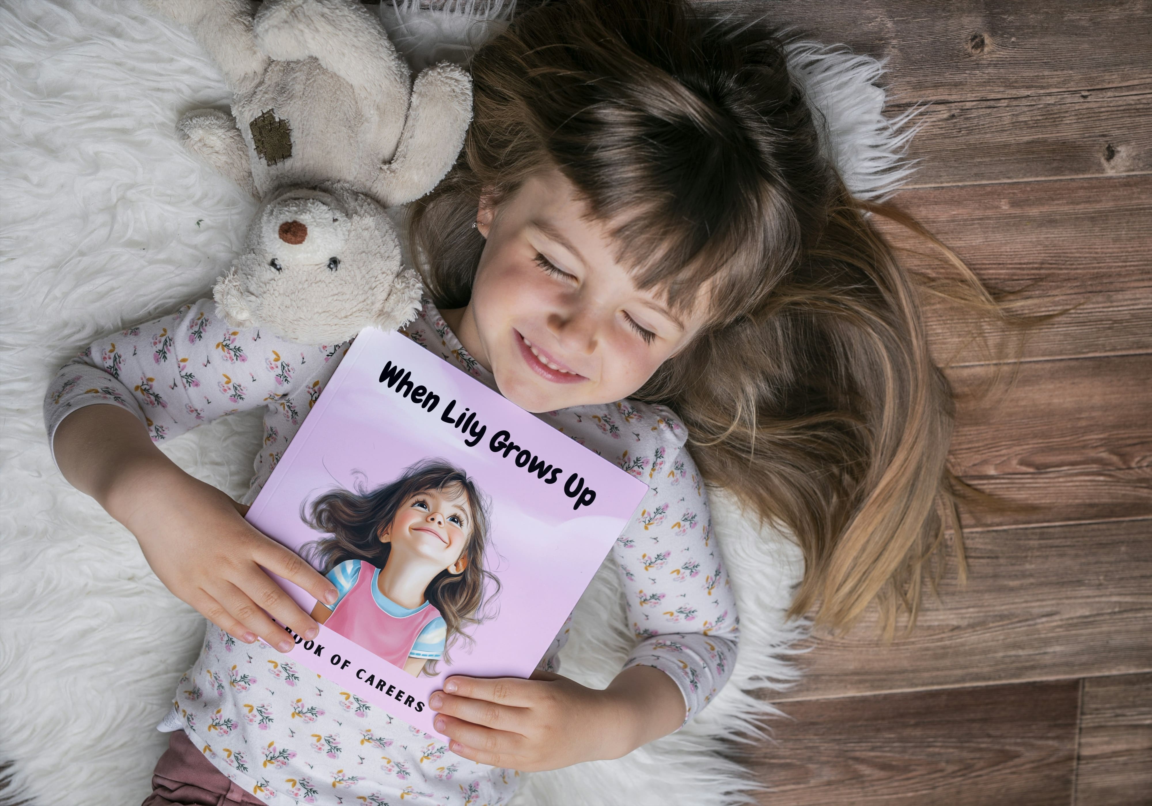 Girl named Lily with eyes closed enjoying her personalized book of careers from Stoybabe